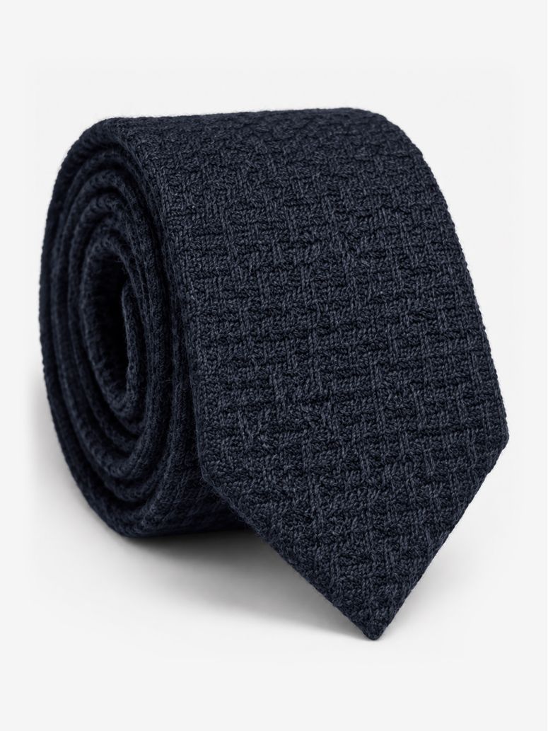 Slips i flätad ull marinblå