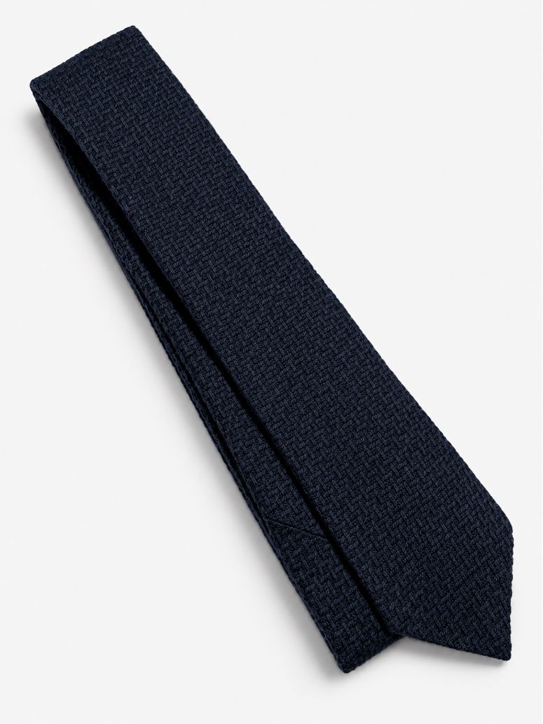 Slips i flätad ull marinblå